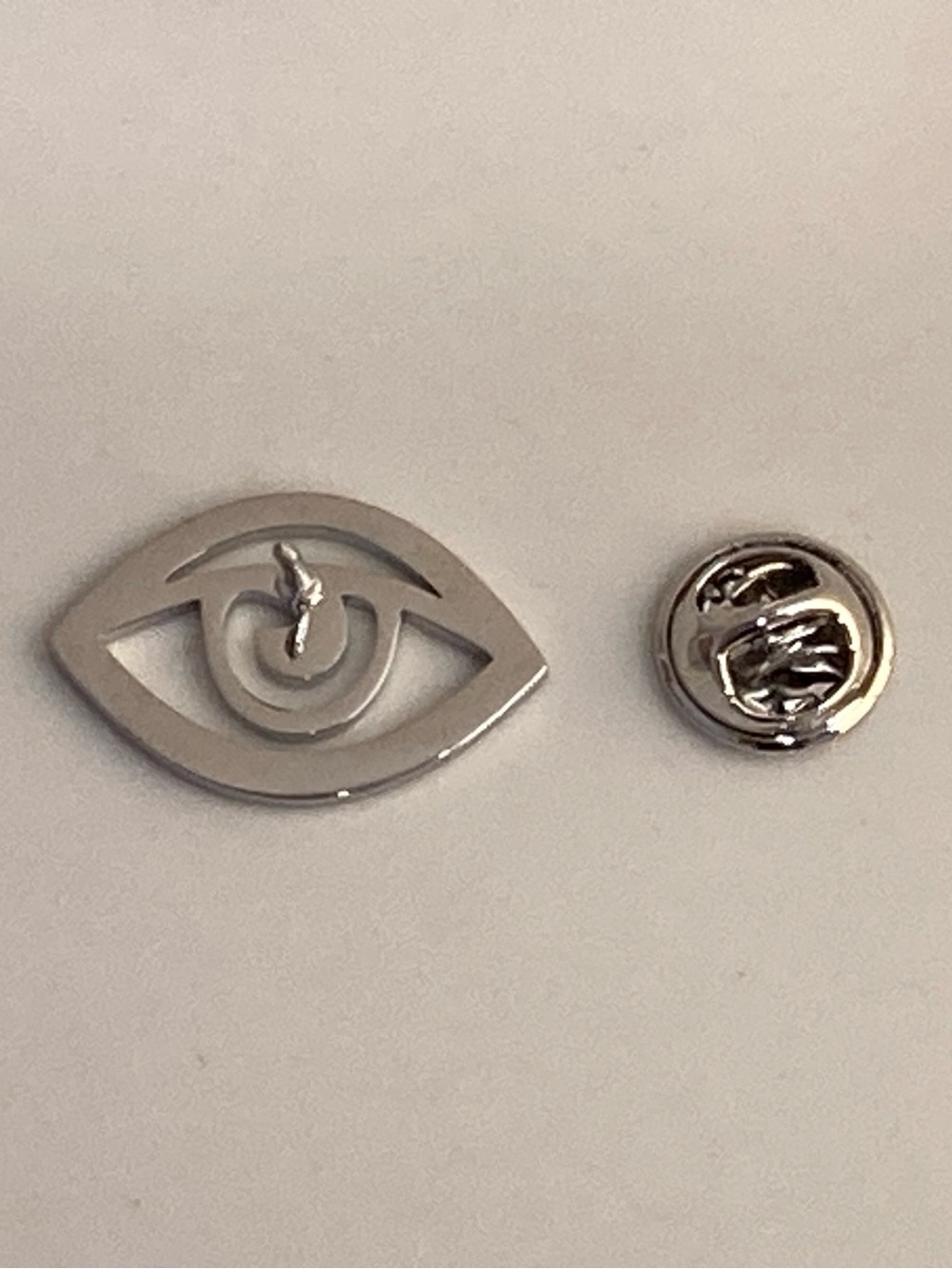 Minimalist Eye-Shaped Metal Pin in Silver Brand New Unisex - Picture 4 of 4